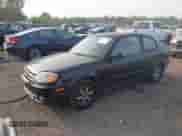 2005 Hyundai Accent GLS z VIN KMHCG35CX5U332441, wystawiony jako IAAI lot #43217479 z przebiegiem 225 254 mil mil oraz . Historia ofert i sprzedaży dostępna na DreamBid. Obrazek 2.