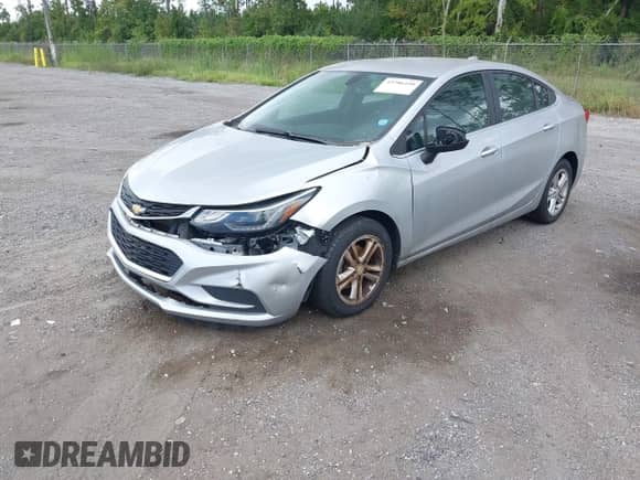 2017 Chevrolet Cruze LT z VIN 1G1BE5SM3H7237486, wystawiony jako IAAI lot #43286450 z przebiegiem 123 809 mil mil oraz . Historia ofert i sprzedaży dostępna na DreamBid. Obrazek 2.