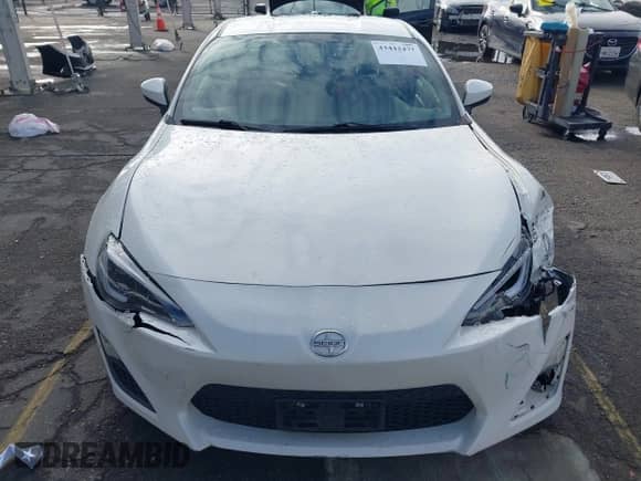 2014 Scion FR-S z VIN JF1ZNAA13E9701999, wystawiony jako IAAI lot #43442477 z przebiegiem 150 402 mil mil oraz . Historia ofert i sprzedaży dostępna na DreamBid. Obrazek 12.
