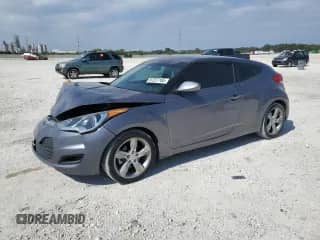 2013 Hyundai Veloster w/Black Int with VIN KMHTC6AD0DU094688, listed as a Copart auction lot 87237165 with 81,433 mi miles and Salvage title. Bid and sale history available at DreamBid. Image 1.