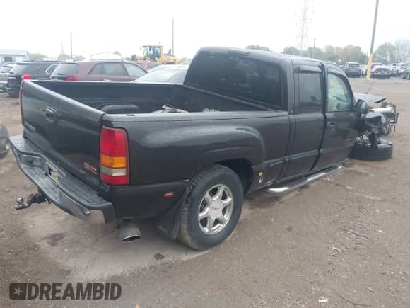 2002 GMC Sierra 1500 Denali z VIN 2GTFK69UX21339224, wystawiony jako IAAI lot #43264760 z przebiegiem 240 363 mil mil oraz . Historia ofert i sprzedaży dostępna na DreamBid. Obrazek 4.