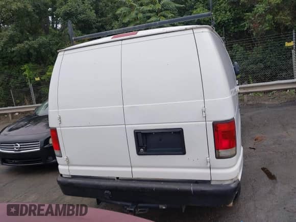2012 Ford Econoline Cargo Commercial with VIN 1FTNE1EW0CDA98132, listed as a IAAI auction lot 42900339 with 264,472 mi miles and . Bid and sale history available at DreamBid. Image 16.