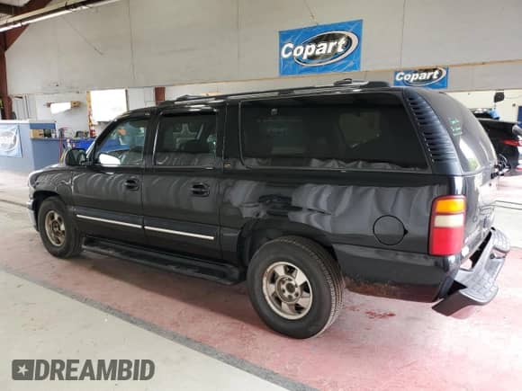 2001 Chevrolet Suburban LT z VIN 3GNFK16T21G242868, wystawiony jako Copart lot #73703894 z przebiegiem 359 694 mil mil oraz Szkoda całkowita • Salvage title. Historia ofert i sprzedaży dostępna na DreamBid. Obrazek 2.