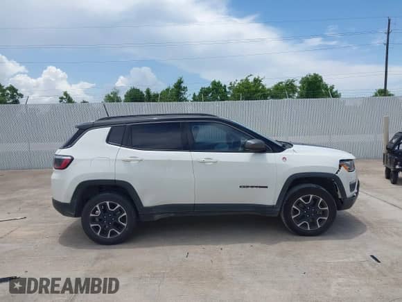 2021 Jeep Compass Trailhawk z VIN 3C4NJDDB3MT520448, wystawiony jako IAAI lot #42675404 z przebiegiem 84 376 mil mil oraz . Historia ofert i sprzedaży dostępna na DreamBid. Obrazek 13.
