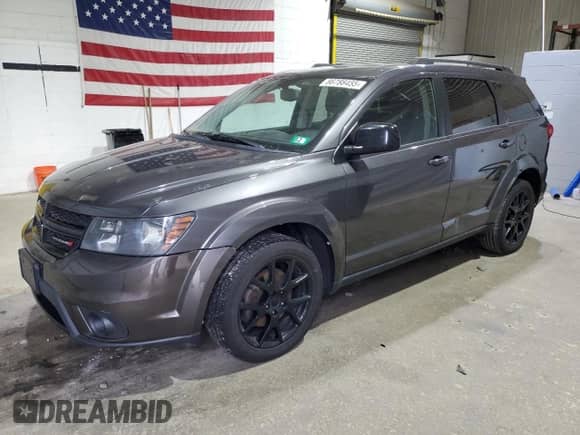 2014 Dodge Journey SXT with VIN 3C4PDCBB4ET290921, listed as a Copart auction lot 86788455 with 142,542 mi miles and Clean title. Bid and sale history available at DreamBid. Image 1.