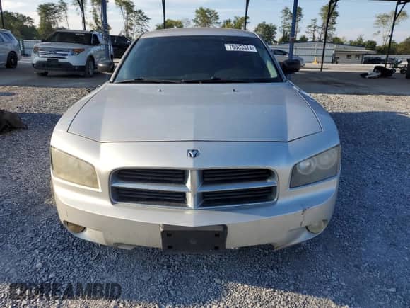 2009 Dodge Charger SXT with VIN 2B3KA33V89H627361, listed as a Copart auction lot 70003374 with 205,159 mi miles and Salvage title. Bid and sale history available at DreamBid. Image 5.