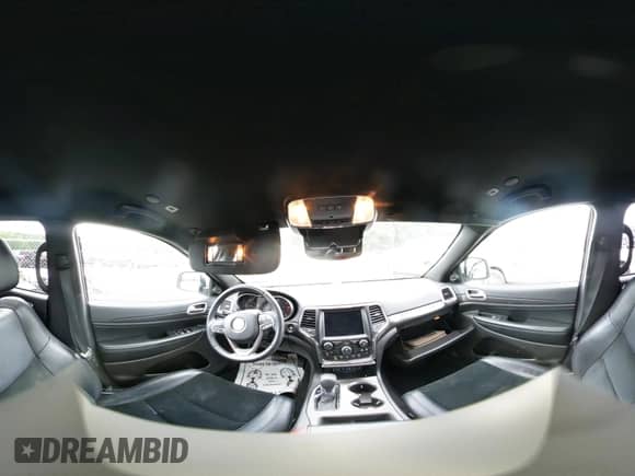 2018 Jeep Grand Cherokee Laredo E with VIN 1C4RJEAG5JC404022, listed as a IAAI auction lot 42586412 with 95,798 mi miles and . Bid and sale history available at DreamBid. Image 18.