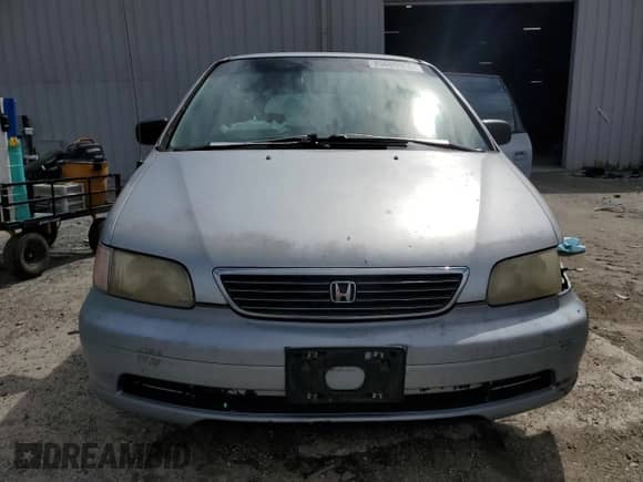 1997 Honda Odyssey LX z VIN JHMRA1864VC009226, wystawiony jako Copart lot #85689955 z przebiegiem 239 023 mil mil oraz Szkoda całkowita • Salvage title. Historia ofert i sprzedaży dostępna na DreamBid. Obrazek 5.