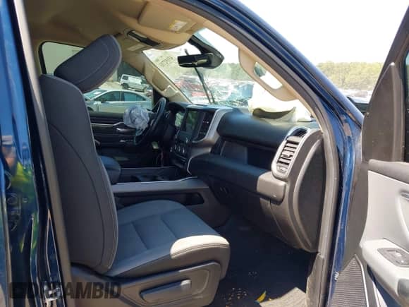 2020 Ram 1500 Lone Star z VIN 1C6RREFT8LN133969, wystawiony jako IAAI lot #43192733 z przebiegiem Nie podano mil oraz . Historia ofert i sprzedaży dostępna na DreamBid. Obrazek 5.