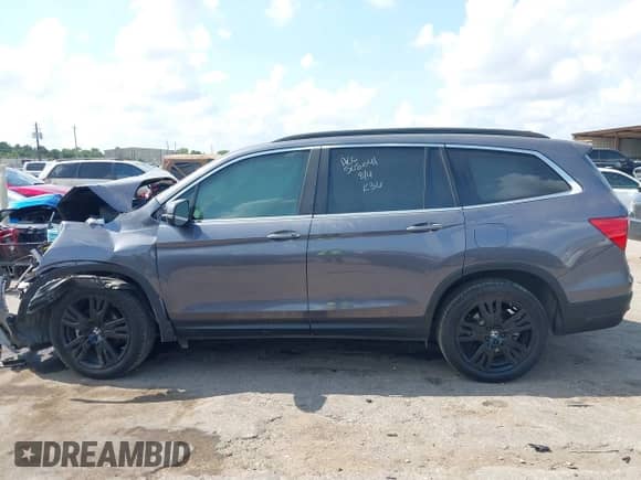 2022 Honda Pilot Special Edition z VIN 5FNYF6H25NB084612, wystawiony jako IAAI lot #42914232 z przebiegiem Nie podano mil oraz . Historia ofert i sprzedaży dostępna na DreamBid. Obrazek 14.