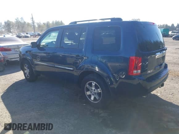 2009 Honda Pilot Touring with VIN 5FNYF489X9B007452, listed as a IAAI auction lot 43262557 with 206,355 mi miles and . Bid and sale history available at DreamBid. Image 3.