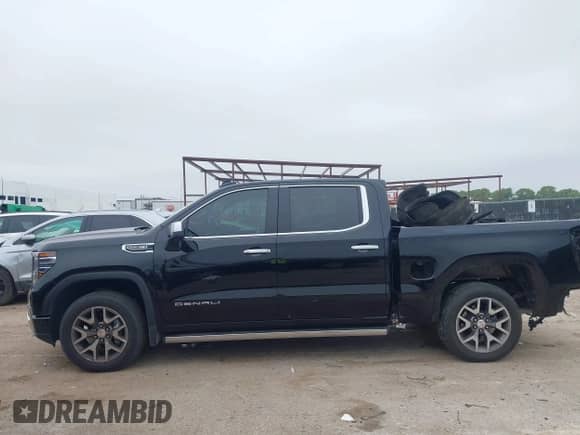 2022 GMC Sierra 1500 Denali z VIN 3GTUUGED6NG676613, wystawiony jako IAAI lot #43119392 z przebiegiem 22 278 mil mil oraz . Historia ofert i sprzedaży dostępna na DreamBid. Obrazek 14.