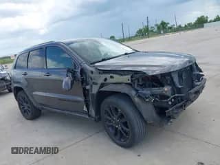 2020 Jeep Grand Cherokee Laredo E with VIN 1C4RJEAG7LC392040, listed as a IAAI auction lot 42946098 with 31,289 mi miles and . Bid and sale history available at DreamBid. Image 1.