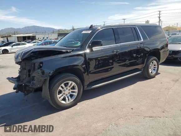 2019 Chevrolet Suburban LS with VIN 1GNSCGKC9KR258037, listed as a Copart auction lot 51495435 with 149,346 mi miles and Salvage title. Bid and sale history available at DreamBid. Image 1.