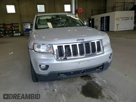 2012 Jeep Grand Cherokee Limited с VIN 1C4RJFBGXCC213607, выставлен на аукционе Copart как лот 67768305 с пробегом 178 885 миль миль и Списание • Salvage title. История ставок и продаж доступна на DreamBid. Изображение 14.