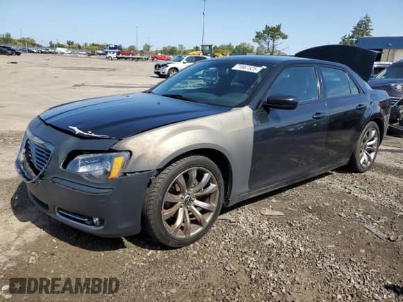 2014 Chrysler 300 S with VIN 2C3CCABG3EH357037, listed as a Copart auction lot 71667325 with 139,950 mi miles and Salvage title. Bid and sale history available at DreamBid. Image 1.