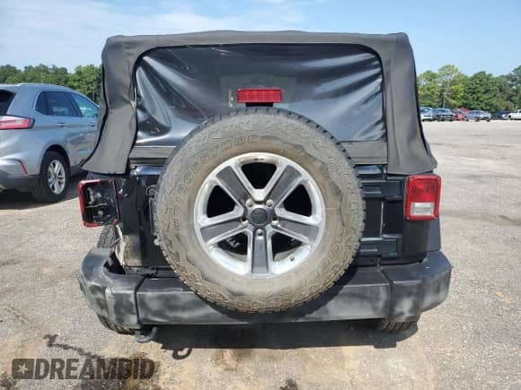 2011 Jeep Wrangler Sport с VIN 1J4AA2D19BL609003, выставлен на аукционе Copart как лот 69645155 с пробегом 102 835 миль миль и Списание • Salvage title. История ставок и продаж доступна на DreamBid. Изображение 6.