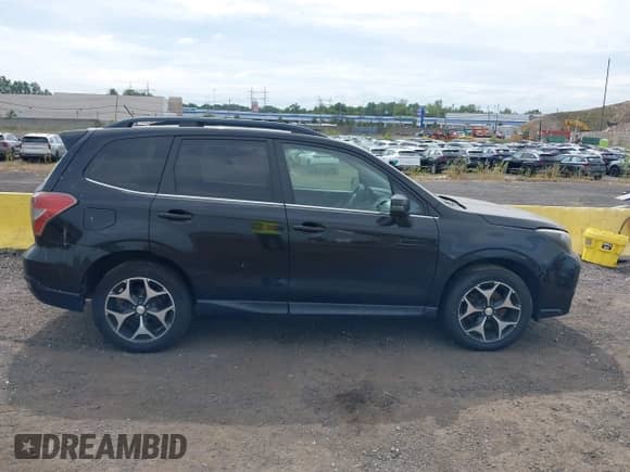 2014 Subaru Forester XT Touring z VIN JF2SJGMC1EH405328, wystawiony jako IAAI lot #43177698 z przebiegiem 156 351 mil mil oraz . Historia ofert i sprzedaży dostępna na DreamBid. Obrazek 14.