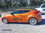2013 Hyundai Veloster w/Black Int z VIN KMHTC6AD8DU085270, wystawiony jako IAAI lot #43240226 z przebiegiem 119 444 mil mil oraz . Historia ofert i sprzedaży dostępna na DreamBid. Obrazek 14.