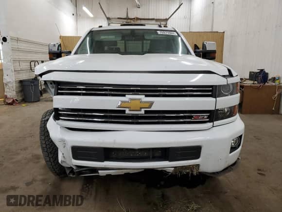 2015 Chevrolet Silverado 3500HD LTZ с VIN 1GC4K0E80FF599384, выставлен на аукционе Copart как лот 76975984 с пробегом 73 351 миль миль и Списание • Salvage title. История ставок и продаж доступна на DreamBid. Изображение 5.