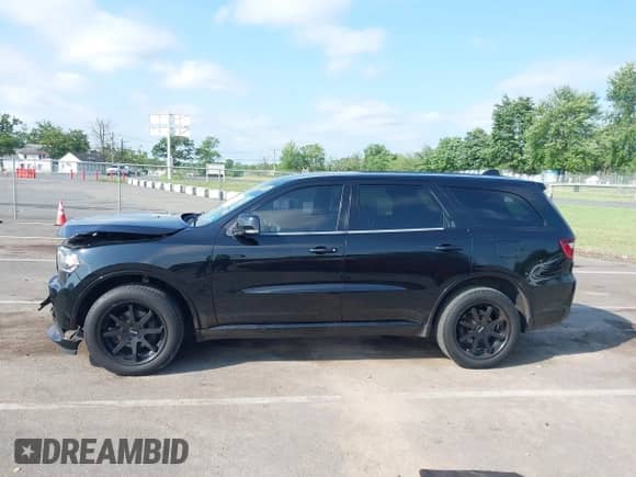 2017 Dodge Durango GT with VIN 1C4RDJDGXHC797019, listed as a IAAI auction lot 42802150 with 107,038 mi miles and . Bid and sale history available at DreamBid. Image 14.