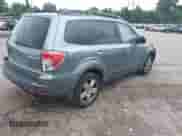 2009 Subaru Forester X with VIN JF2SH63649H734645, listed as a IAAI auction lot 42752138 with 160,389 mi miles and . Bid and sale history available at DreamBid. Image 4.