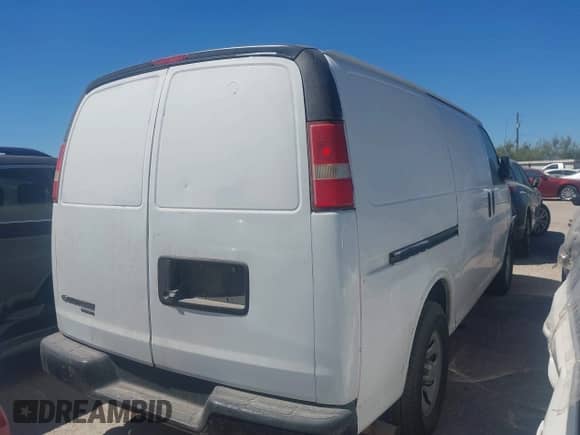 2014 Chevrolet Express Cargo with VIN 1GCSGAFX3E1163645, listed as a IAAI auction lot 42621079 with 251,814 mi miles and . Bid and sale history available at DreamBid. Image 4.