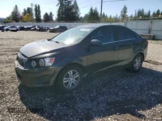 2014 Chevrolet Sonic LT z VIN 1G1JC5SG2E4147724, wystawiony jako Copart lot #81550885 z przebiegiem 124 747 mil mil oraz Szkoda całkowita • Salvage title. Historia ofert i sprzedaży dostępna na DreamBid. Obrazek 1.