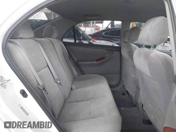 2004 Toyota Corolla CE z VIN JTDBR32E942041472, wystawiony jako IAAI lot #43225890 z przebiegiem 144 291 mil mil oraz . Historia ofert i sprzedaży dostępna na DreamBid. Obrazek 8.