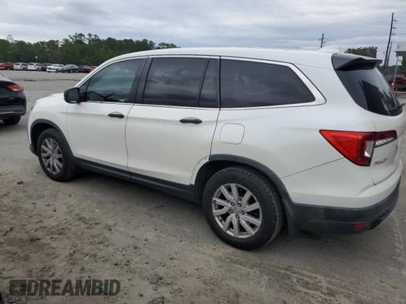 2019 Honda Pilot LX с VIN 5FNYF5H15KB037187, выставлен на аукционе Copart как лот 86053845 с пробегом 200 851 миль миль и Списание • Salvage title. История ставок и продаж доступна на DreamBid. Изображение 2.