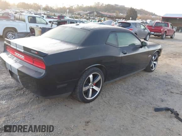 2012 Dodge Challenger SRT-8 392 with VIN 2C3CDYCJ5CH121521, listed as a IAAI auction lot 40747392 with 147,725 mi miles and . Bid and sale history available at DreamBid. Image 4.