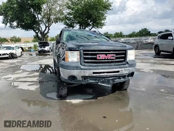2011 GMC Sierra 1500 Work Truck z VIN 1GTN2TEA4BZ441924, wystawiony jako Copart lot #58874805 z przebiegiem 148 790 mil mil oraz Szkoda całkowita • Salvage title. Historia ofert i sprzedaży dostępna na DreamBid. Obrazek 13.