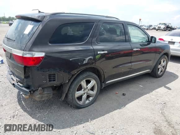 2013 Dodge Durango Citadel with VIN 1C4RDHEG3DC562477, listed as a IAAI auction lot 42645709 with 207,383 mi miles and . Bid and sale history available at DreamBid. Image 4.