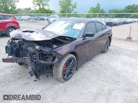 2021 Dodge Charger GT with VIN 2C3CDXMG2MH528792, listed as a IAAI auction lot 42593760 with 67,842 mi miles and . Bid and sale history available at DreamBid. Image 2.