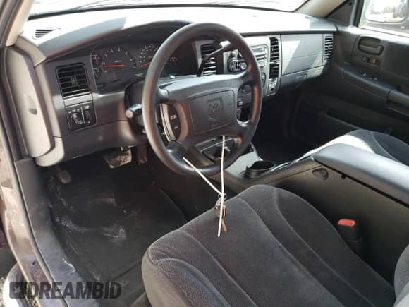 2004 Dodge Dakota SLT z VIN 1D7HG42N14S749128, wystawiony jako Copart lot #60733654 z przebiegiem 101 249 mil mil oraz Szkoda całkowita • Salvage title. Historia ofert i sprzedaży dostępna na DreamBid. Obrazek 8.