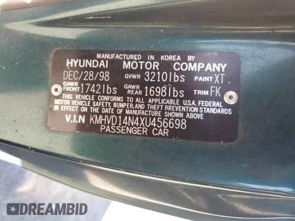 1999 Hyundai Accent L z VIN KMHVD14N4XU456698, wystawiony jako Copart lot #41733345 z przebiegiem 197 574 mil mil oraz Szkoda całkowita • Salvage title. Historia ofert i sprzedaży dostępna na DreamBid. Obrazek 13.