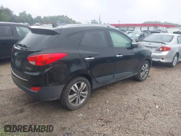 2014 Hyundai Tucson Limited z VIN KM8JU3AG7EU848989, wystawiony jako IAAI lot #42610713 z przebiegiem 175 587 mil mil oraz . Historia ofert i sprzedaży dostępna na DreamBid. Obrazek 4.