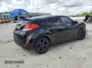 2014 Hyundai Veloster z VIN KMHTC6AD3EU196343, wystawiony jako Copart lot #59891375 z przebiegiem 127 594 mil mil oraz Szkoda całkowita • Salvage title. Historia ofert i sprzedaży dostępna na DreamBid. Obrazek 3.