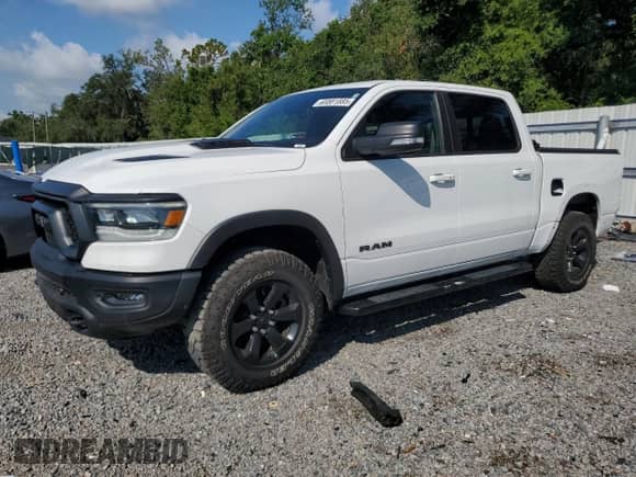 2022 Ram 1500 Rebel z VIN 1C6SRFLM2NN116060, wystawiony jako Copart lot #65881885 z przebiegiem 67 490 mil mil oraz Nie do naprawy • Non repairable. Historia ofert i sprzedaży dostępna na DreamBid. Obrazek 1.