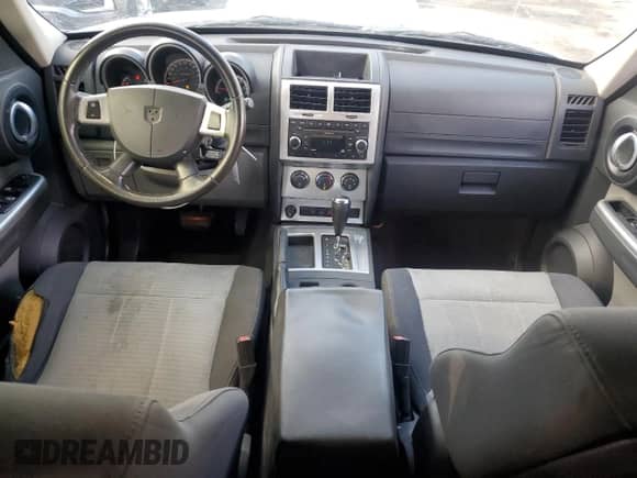 2007 Dodge Nitro SLT with VIN 1D8GT58K97W666341, listed as a Copart auction lot 69343634 with 168,897 mi miles and Salvage title. Bid and sale history available at DreamBid. Image 8.