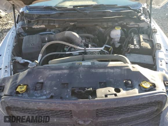 2022 Ram 1500 Tradesman with VIN 3C6RR7KT1NG174389, listed as a Copart auction lot 82360454 with 117,030 mi miles and Salvage title. Bid and sale history available at DreamBid. Image 11.