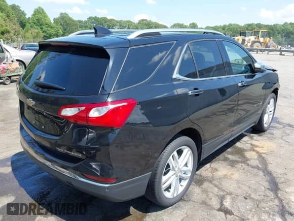 2021 Chevrolet Equinox Premier with VIN 2GNAXXEV8M6143697, listed as a IAAI auction lot 42303696 with 41,897 mi miles and . Bid and sale history available at DreamBid. Image 4.