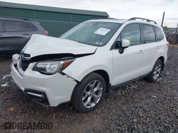 2017 Subaru Forester Touring with VIN JF2SJAWC3HH497864, listed as a IAAI auction lot 43502529 with 36,939 mi miles and . Bid and sale history available at DreamBid. Image 2.