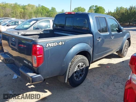 2019 Nissan Frontier SV with VIN 1N6AD0EVXKN711897, listed as a IAAI auction lot 41985818 with 98,352 mi miles and . Bid and sale history available at DreamBid. Image 4.