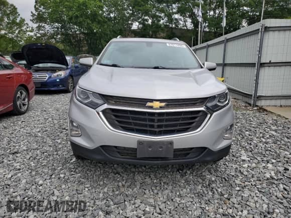 2018 Chevrolet Equinox LT с VIN 2GNAXTEX1J6277960, выставлен на аукционе Copart как лот 61011455 с пробегом 135 650 миль миль и Списание • Salvage title. История ставок и продаж доступна на DreamBid. Изображение 5.