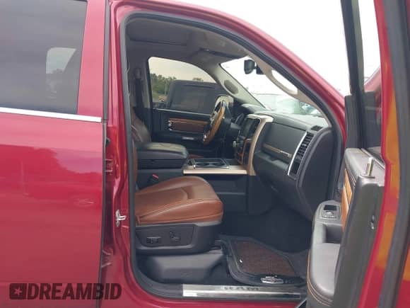 2014 Ram 1500 Longhorn z VIN 1C6RR7PTXES104083, wystawiony jako IAAI lot #42571789 z przebiegiem 148 919 mil mil oraz . Historia ofert i sprzedaży dostępna na DreamBid. Obrazek 5.