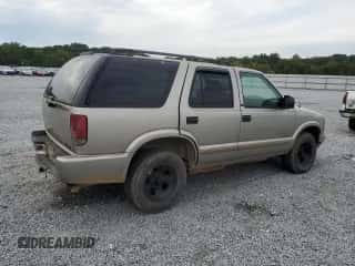 2002 Chevrolet Blazer LS с VIN 1GNCS13W42K237408, выставлен на аукционе Copart как лот 71353484 с пробегом 169 739 миль миль и Списание • Salvage title. История ставок и продаж доступна на DreamBid. Изображение 3.