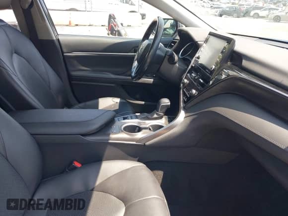 2021 Toyota Camry Hybrid XLE with VIN 4T1F31AK3MU554067, listed as a IAAI auction lot 42681018 with 53,630 mi miles and . Bid and sale history available at DreamBid. Image 5.