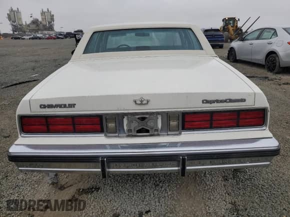 1987 Chevrolet Caprice с VIN 1G1BU51H5HX102002, выставлен на аукционе Copart как лот 58674045 с пробегом 82 659 миль миль и Чистый • Clean title. История ставок и продаж доступна на DreamBid. Изображение 6.