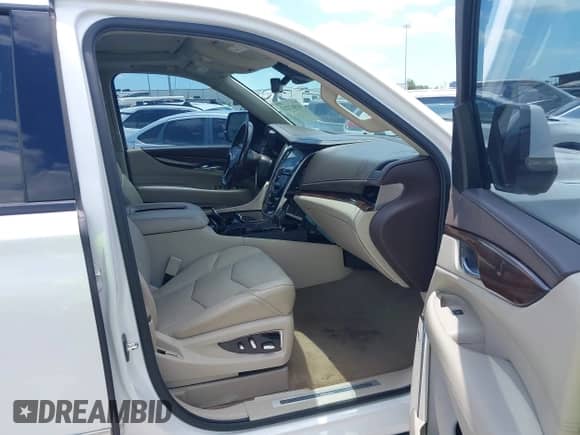 2017 Cadillac Escalade Luxury with VIN 1GYS3BKJ2HR145088, listed as a IAAI auction lot 41517213 with 52,329 mi miles and . Bid and sale history available at DreamBid. Image 5.